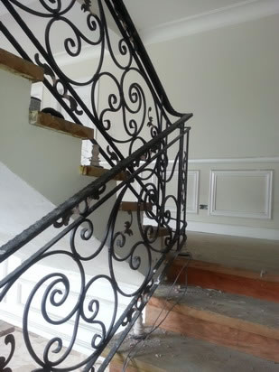Wrought Iron Stair Railing, Entrance Gate, and False Balcony Railing Wrought Iron Stair Railing, Entrance Gate, and False Balcony Railing