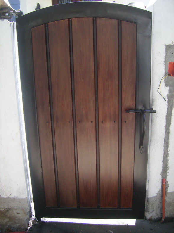 Pedestrian Gate in G.I. Sheet Bended and in Wood Finish. Pedestrian Gate in G.I. Sheet Bended and in Wood Finish.