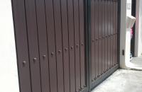 Gate in wood finish and wrought iron frame and studs accent. Gate in wood finish and wrought iron frame and studs accent.